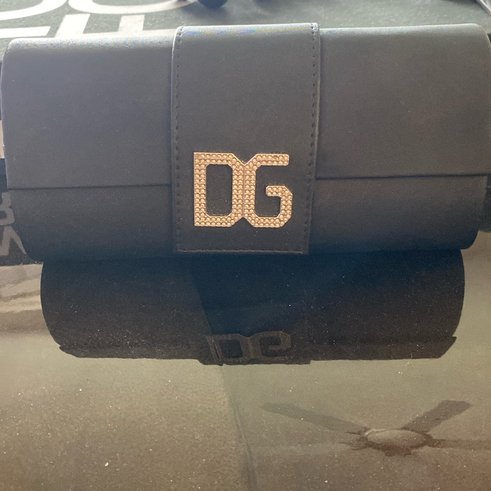 BRAND NEW DOLCE AND GABBANA never been used satin finish outside of case by!!